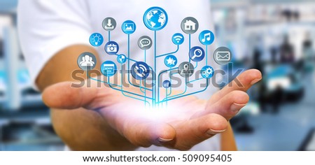 Young businessman holding modern digital electronic circuit with icons in his hand 3D rendering