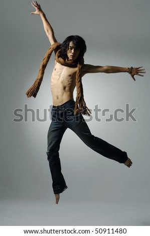 jumping male on isolated studio picture