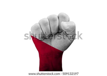 Man hand fist of POLAND flag painted