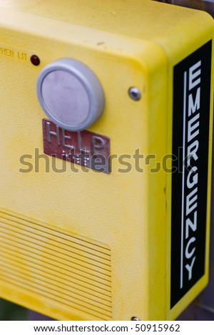 Closeup of an emergency call box, taken on a university campus.