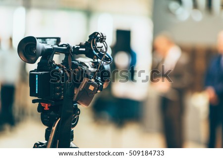Television camera recording event Royalty-Free Stock Photo #509184733