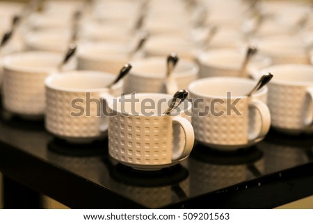collection white coffee or tea cups in restaurant