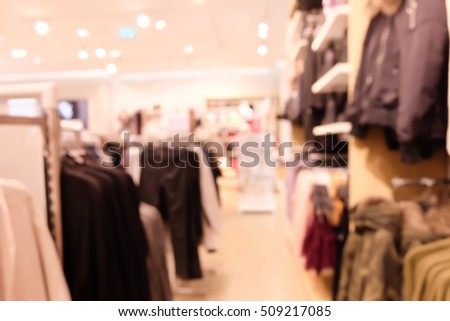 abstract blurred background of clothing  store in shopping mall.