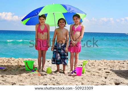 little children at the beach