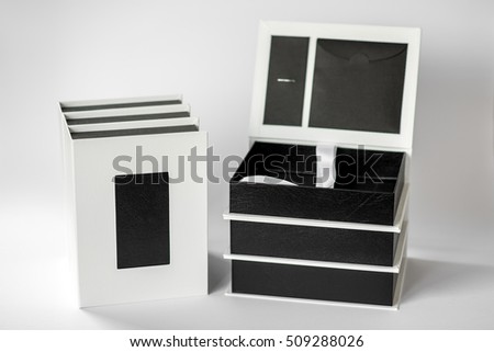 The box for photos. Imitation leather black and white.