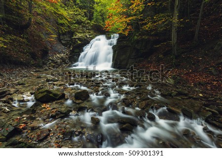 Beautiful waterfall in forest, autumn landscape in south Poland/ Autumn Waterfall
