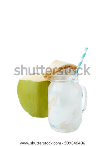Coconut water with glass and straw on white isolated background. Clipping path.