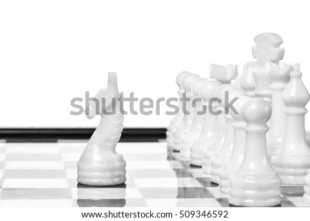 White chessmen on chessboard isolated