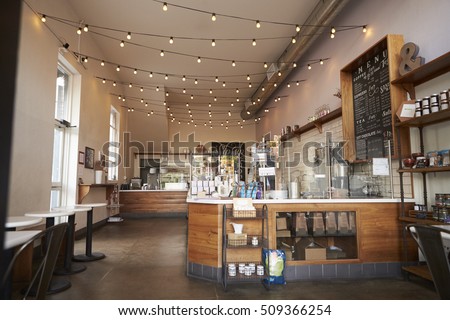 Empty cafe or bar interior, daytime Royalty-Free Stock Photo #509366254
