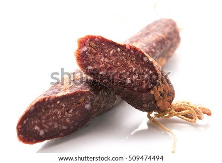 thin sliced jerked sausage on a white background