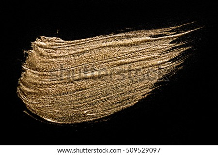 Gold textured painting on black background. Texture of black gold.