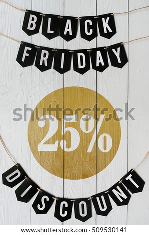Black Friday twenty five percent Discount paper banner garland lettering hanging on white barn wood planks background. Luxurious vertical holiday flyer.