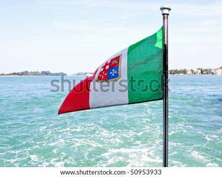 Italian flag at rear end of boat