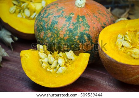 ripe pumpkin and pumpkin seeds in it