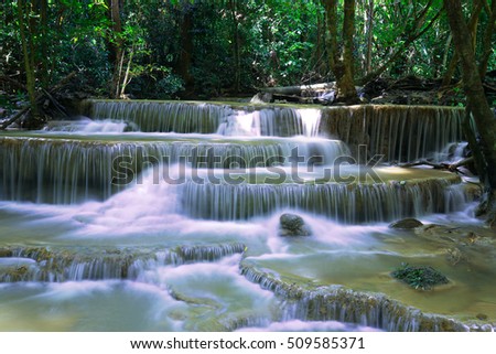 Landscape photo, Huay Mae Kamin Waterfall, beautiful waterfall in rainforest at Kanchanaburi province, Thailand