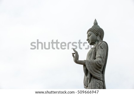thai standing buddha statue