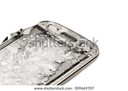 Ruined mobile phone on white background. Isolated
