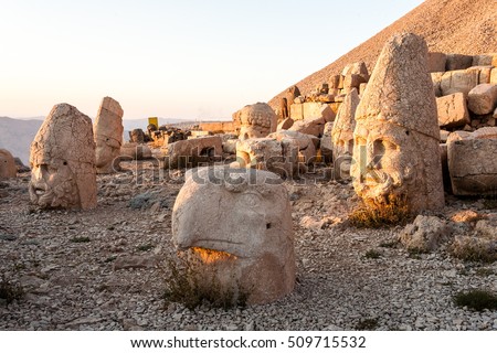 Toppled heads of the gods on East terrace at the top of Nemrut dagi in Turkey. The UNESCO World Heritage Site at Mount Nemrut where King Antiochus is reputedly entombed.
