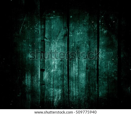 Beautiful vintage grunge wood surface. Old green background with faded central area for your text or picture