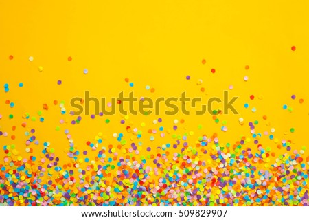 Frame made of colored confetti. Royalty-Free Stock Photo #509829907