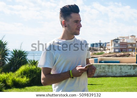 young man using his mobile phone