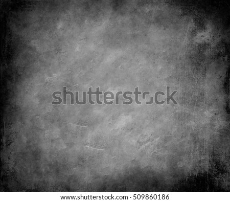 Beautiful grey abstract fabric texture background with frame and faded central area for your text or picture