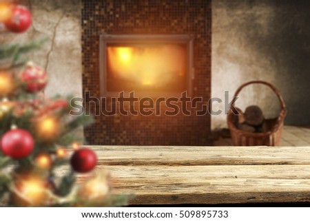 Interior of xmas tree and fireplace with wooden old top of free space 