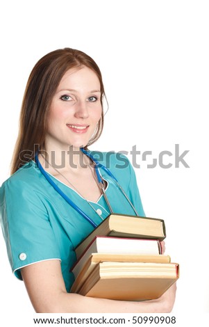 The portrait of kind female doctor in the green uniform with books
