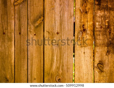 brown golden vertical vintage old wooden planks with cracked color paint texture, wooden planks with scratch and cracked paint as background, high quality resolution