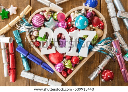 Happy new Year with colorful party crackers and decorations