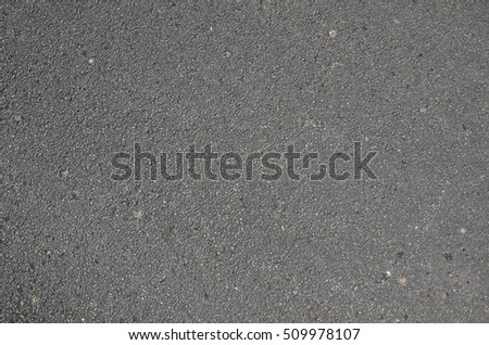 Asphalt concrete roadway pavement surface. Grey flat texture for 3D work, textured backround Royalty-Free Stock Photo #509978107