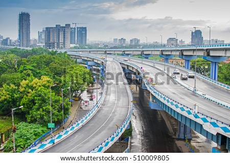 Parama Island flyover, popularly known as Ma or Maa flyover is a 4.5 kilometer long flyover in Kolkata. It is built as a traffic corridor from Alipore to Eastern Metropolitan Bypass,West Bengal,India. Royalty-Free Stock Photo #510009805