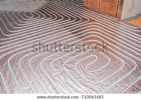 water floor heating system, underfloor heating Royalty-Free Stock Photo #510061681