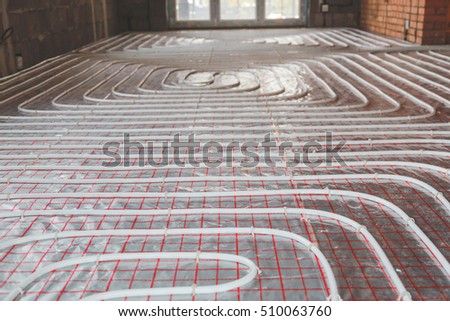 Heating posed in a under construction building Royalty-Free Stock Photo #510063760