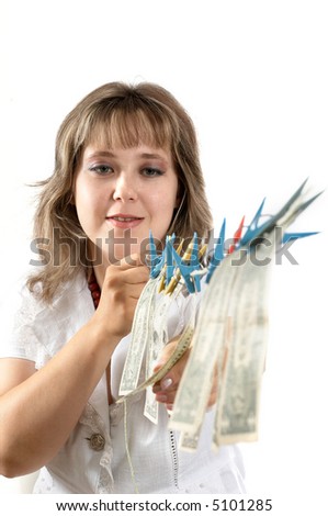 An image of smiling woman with dollars