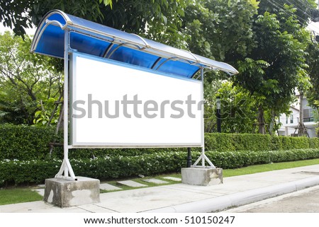 blank bus stop sign and beautiful garden