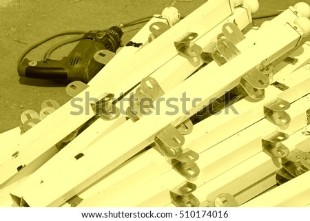 metal parts in a construction site, closeup of photo