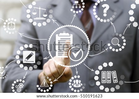 businessman presses compliance icon on virtual screen. Man touched a clipboard sign with check mark. Company, strategy, business, technology, finance, work concept. Compliance - chart with icons.