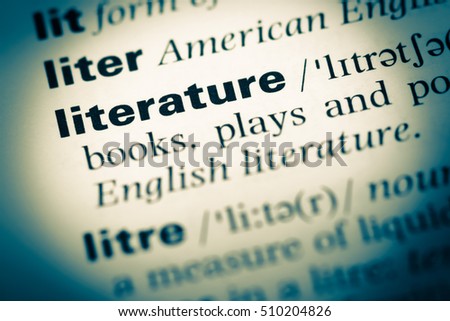 Close up of old English dictionary page with word literature Royalty-Free Stock Photo #510204826
