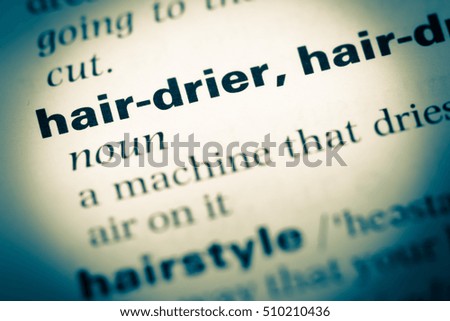 Close up of old English dictionary page with word hair drier