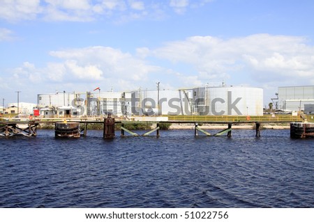 oil tanks in the port of Tampa Florida on a cloudy day