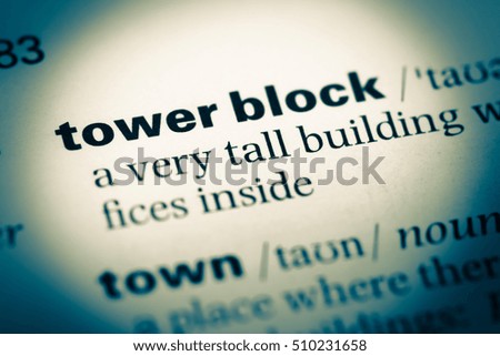 Close up of old English dictionary page with word tower block