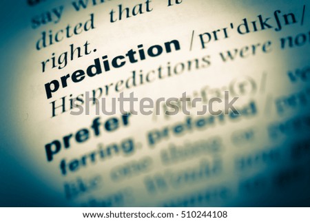 Close up of old English dictionary page with word prediction