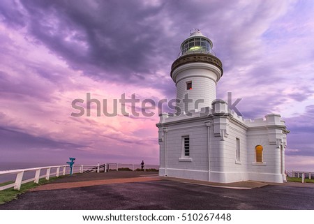 Byron Bay lighthouse at sunset with pink sky Royalty-Free Stock Photo #510267448