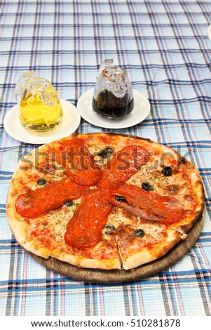 the best pizza with spicy salami , mozzarella cheese , italian cheese