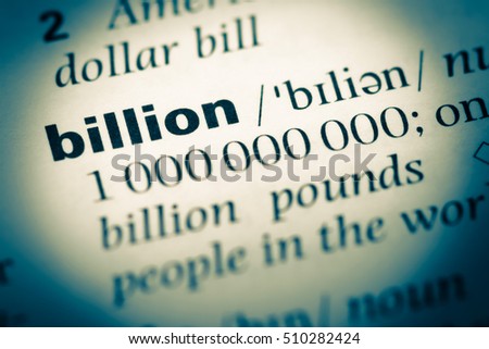 Close up of old English dictionary page with word billion Royalty-Free Stock Photo #510282424
