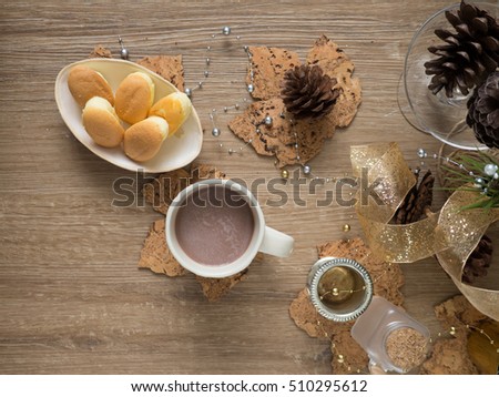hot chocolate christmas pinecone butter bread wood background