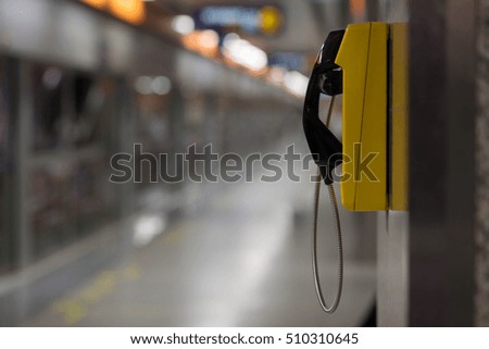 Emergency telephone in subway train station