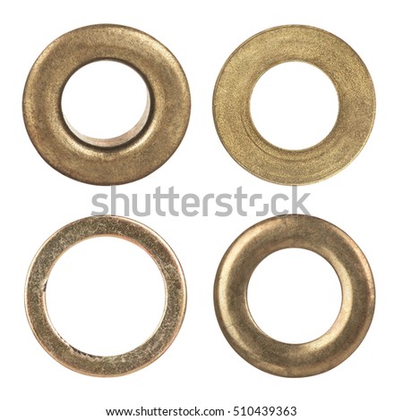 Set eyelets, flat washer and grommets on an isolated white background Royalty-Free Stock Photo #510439363