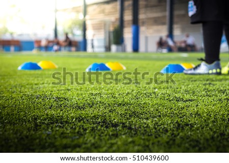 Close up, the artificial turf with a white stripe and a football Royalty-Free Stock Photo #510439600